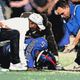 Team trainers attend to the Giants’ Kayvon Thibodeaux after an injury during the first half of a preseason game against the Cincinnati Bengals at MetLife Stadium.